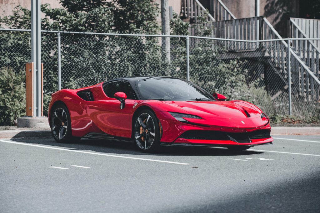 Ferrari SF90 Stradale: A Sleek, Red Masterpiece Parks with Precision