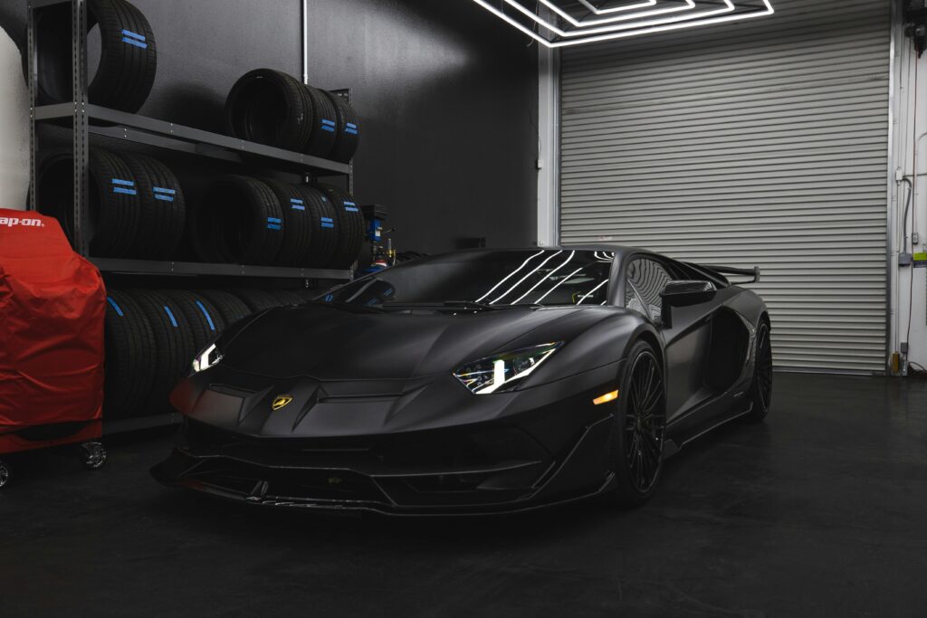 Lamborghini Sports Cars: Sleek Black Aventador in a Garage