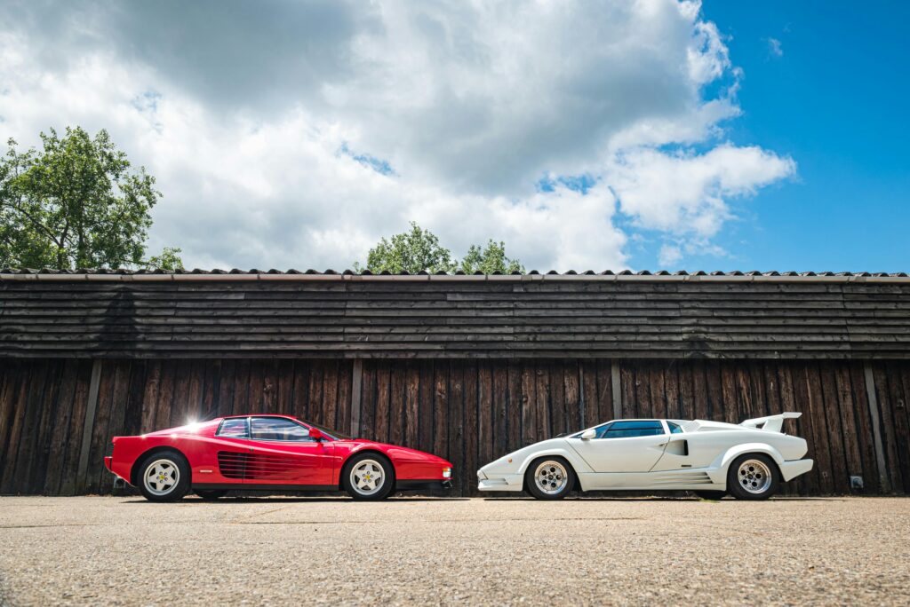 Lamborghini Sports Cars: Timeless Duo - Red Ferrari Testarossa and White Lamborghini Countach